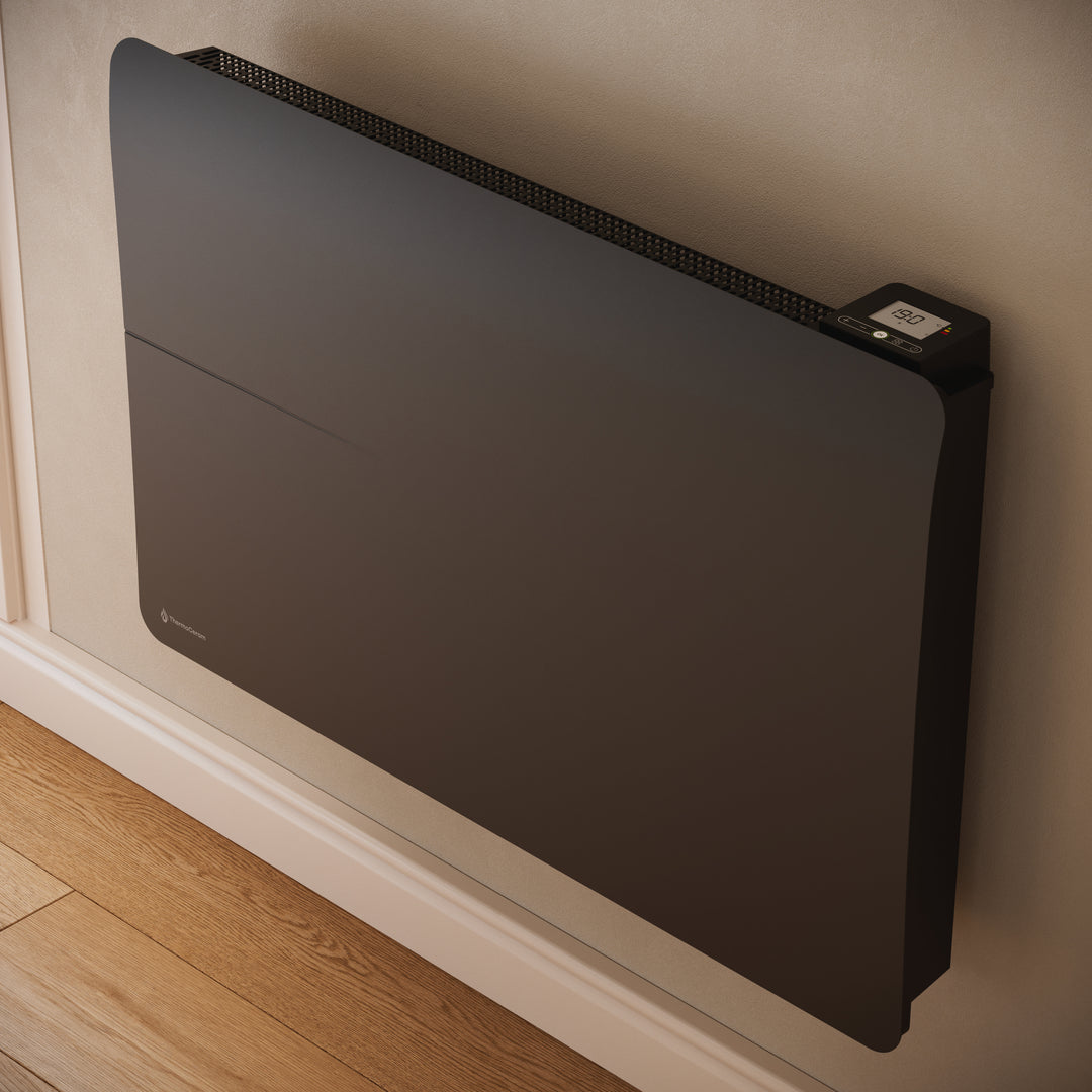 Radiateur Cira 2000 W noir — gros plan de trois quarts sur le thermostat